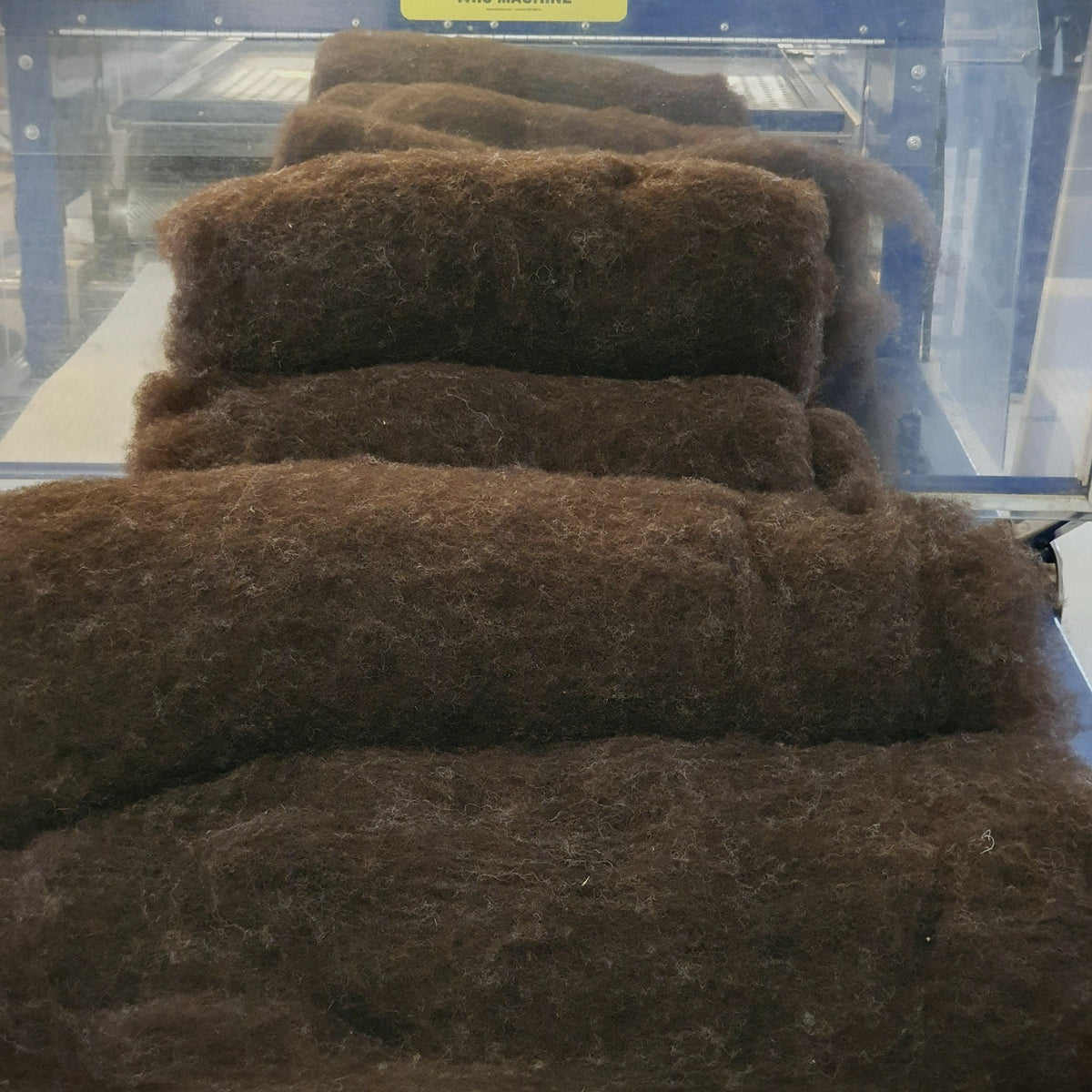 Mörkbrun spinnfiber